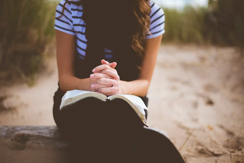 woman with open Bible